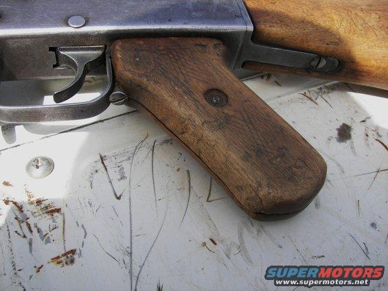 Wooden gun grip and trigger mechanism