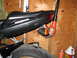 2008 Yamaha FZR1000 - A close-up view of a motorcycle's tail section, a fender eliminator and a leaf blower nozzle.
