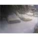 1971 Mercury Cyclone - Two vehicles are parked outside and covered in snow during winter.