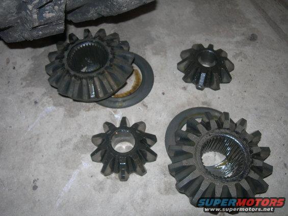 Differential gears on concrete floor, part of a D60 swap