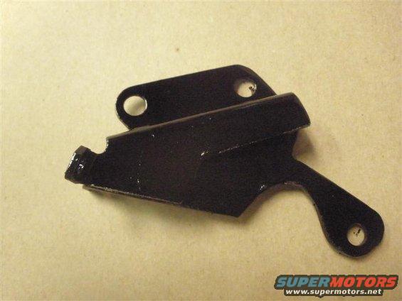 Modified wastegate bracket, we cut the old one down and made it clear the AC housing.