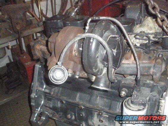 Engine with turbocharger and modified motor mounts