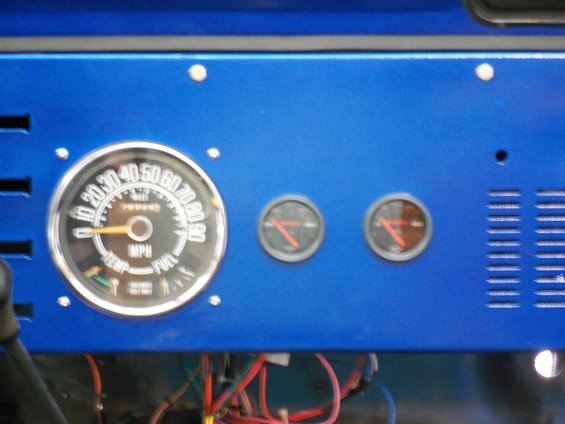 1978 Jeep CJ5 dashboard with speedometer, temperature, and fuel gauges. Wires visible below