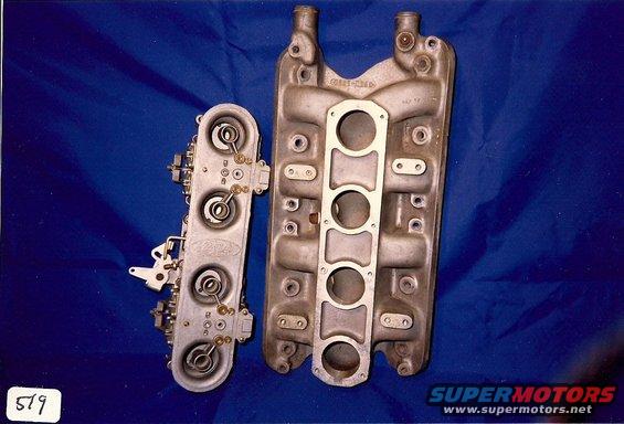carburetor and intake manifold on blue background