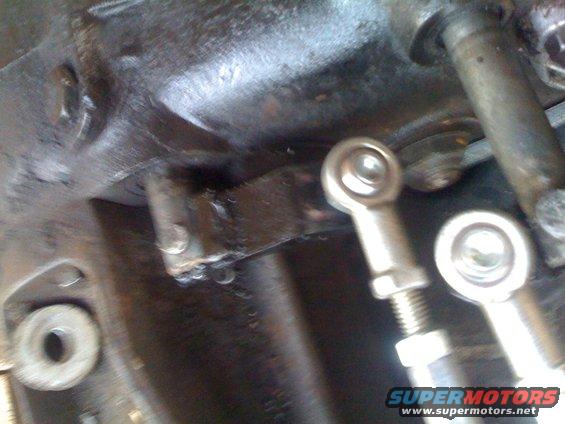 close-up of transfer case linkage with rod ends