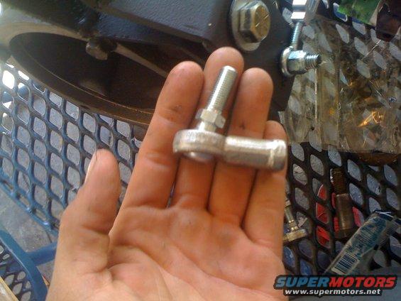 Rod end joint held in hand, part of a linkage system