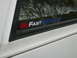 1988 Ford Bronco - Sticker on window reads "Go Fast Broncos". Year is not visible.