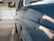 1993 Ford F-250 - Side view of a blue 1993 Ford F-250 pickup truck.