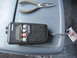 1993 Ford F-250 - A Maxon 27-MCB CB radio and a pair of pliers are placed on a textured gray surface.