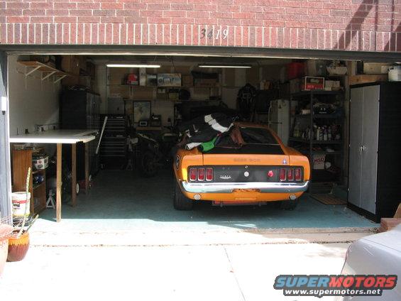 Orange 1970 Ford Mustang rear view with BOSS 302 badging
