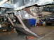 1986 Toyota Hilux - Underside view of a vehicle's drivetrain with a custom skid plate installed.