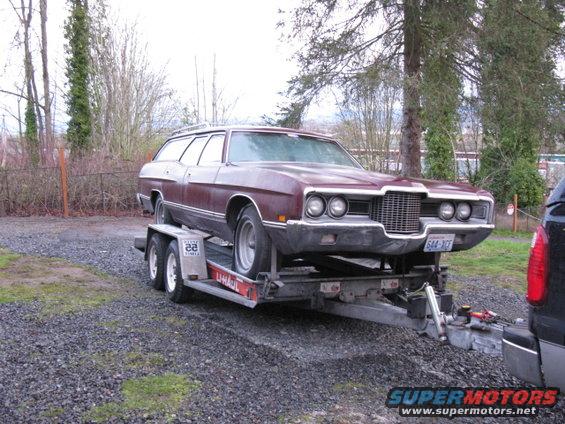 Maroon 1971 Ford Wagon on trailer, front 3/4 view