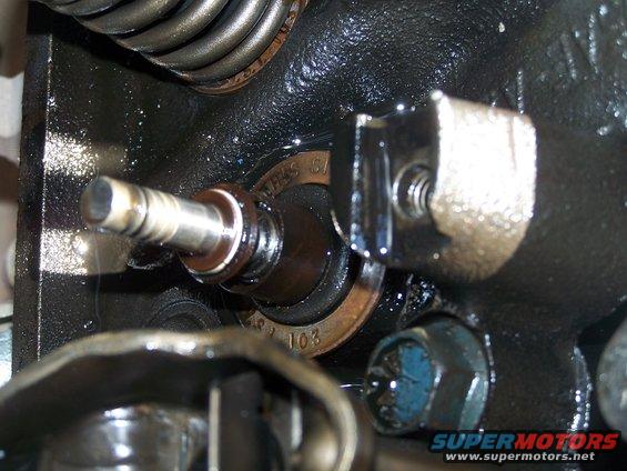Engine valve train component with visible text 'SEALS G1 81 103'