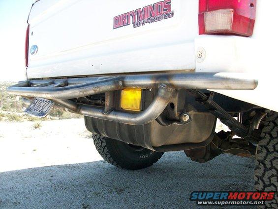 1996 Ford Bronco rear with custom bumper, fuel tank, and yellow light