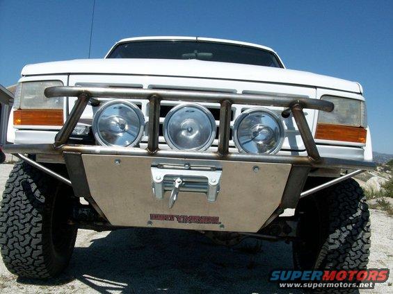 1996 Ford Bronco front view with custom winch bumper and three driving lights