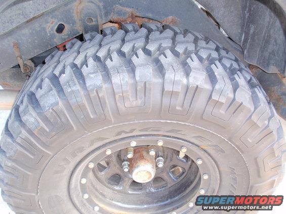 tires.jpg new tires still under the guys jeep