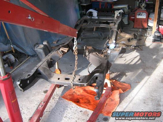 Vehicle frame suspended by engine hoist