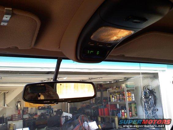 Interior overhead console with digital display showing 71 degrees and 'S'