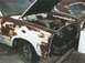 1967 Mercury Cyclone - This car shows significant rust damage and has its hood open, revealing the engine compartment.