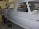 1979 Ford F-250 - This 1979 Ford F-250 crew cab pickup truck is shown in primer, likely awaiting paintwork.