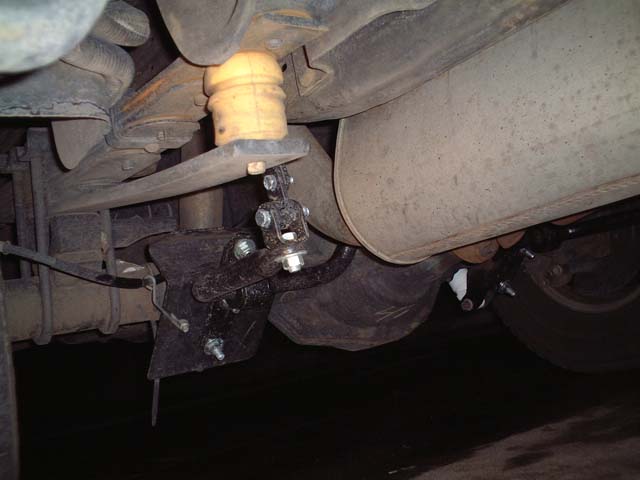 dscf00012.jpg Here's what it looks like when you peak underneath the Excursion when it's fully installed.  Total install time was 2-3 hours.  I did it in the snow when it was wet and cold.  If you can avoid that, your knuckles, fingers, and your sanity will thank you.