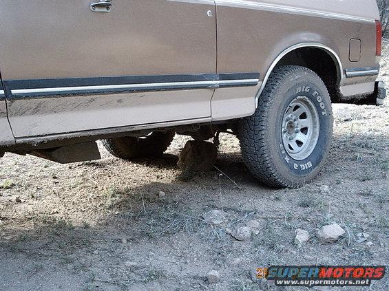 imag0028.jpg Went camping by Lake Roberts then went exploring drove to the end of a road and went to turn around and backed into a rock perfect to get high centered on the rock right on  the center of the rear axle it was funny