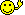 Yellow smiley face icon with a black background