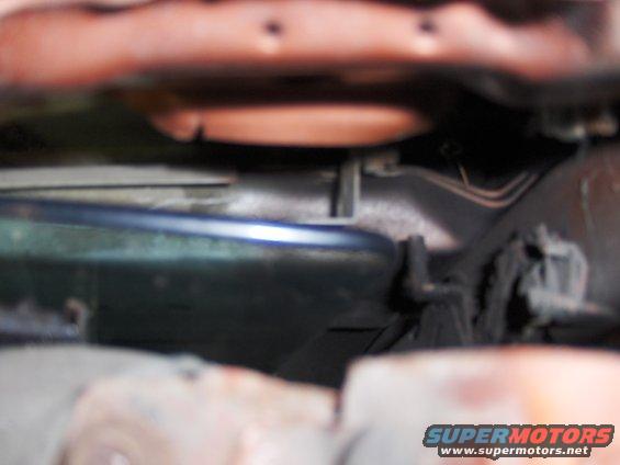 Engine bay components with Supermotors.net watermark
