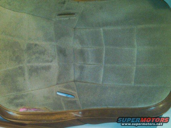 Interior upholstery with brown trim and blue vents