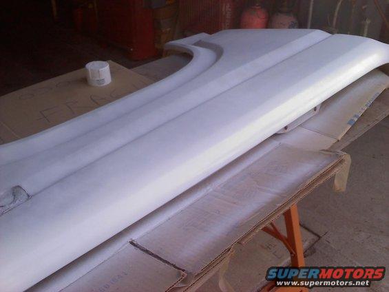 White fender part on a table
