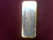 1993 Lincoln Town Car - A close-up of a Cartier lighter with gold trim and a blue insert.