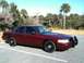 2005 Ford Crown Victoria - Maroon 2005 Ford Crown Victoria Police Interceptor parked in a lot.
