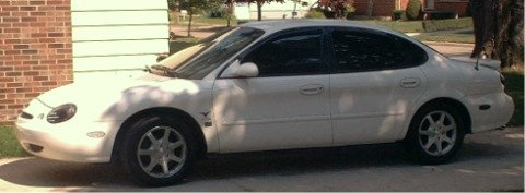 White 1997 Ford Taurus sedan, 3/4 front view