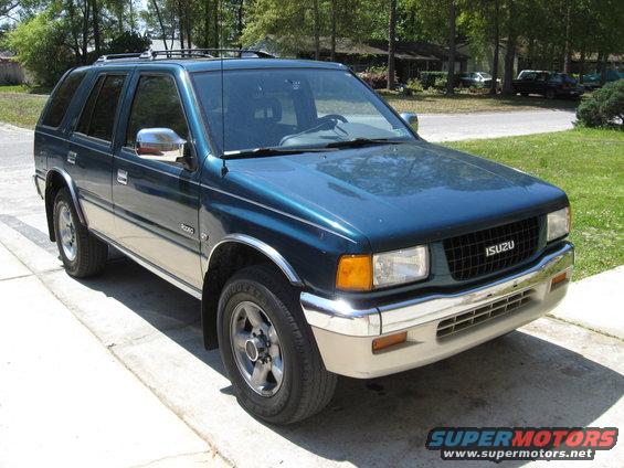 Teal 1993 Isuzu Rodeo parked on a driveway