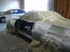 1973 Ford Ranchero - A car in a workshop is being prepped for painting, with another vehicle visible in the background.