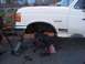 1989 Ford Bronco - Front axle removed from a 1989 Ford Bronco during a repair or modification.