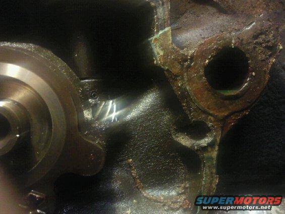 Engine block part with visible 'V4' marking