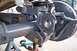 1989 Ford Bronco - Vehicle axle and suspension components are shown on jack stands, with tools visible in the background.