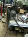 1993 Ford Bronco - Bodywork underway on a 1993 Ford Bronco, focusing on rust repair of the rear quarter panel.