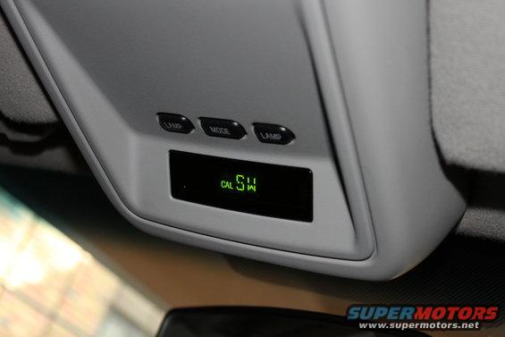Overhead console with buttons labeled LAMP, MODE, LAMP and a green digital display showing 'CAL SW'