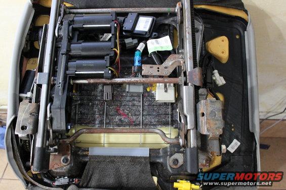 img_1198.jpg wiring is in place and lined up over the 2003 harness. i didnt remove the 2003 harness and the seat still functions 100% stock with both in place as seen above.