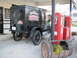 2006 Victory Kingpin - This vintage Jack Daniel's truck is parked at a gas station with old-fashioned pumps and a barrel planter.
