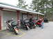 2006 Victory Kingpin - Motorcycles are parked outside the Half Time Bar & Grill.