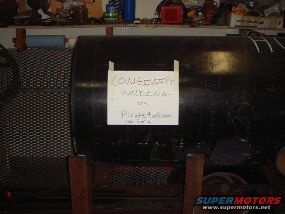 Large metal tank with sign reading 'LONGEVITY WELDING on Pirate4x4.com user bigric'
