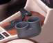 1994 BMW 5 Series - The interior of a 1994 BMW 5 Series shows the center console with a cupholder and automatic gear shifter.