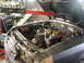 1981 Ford Mustang - Engine removal in progress for a 1981 Ford Mustang, utilizing an engine hoist.