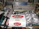 1981 Ford Mustang - Engine parts, including an intake manifold and connecting rods, are laid out on a workbench.