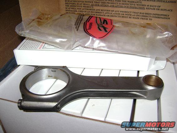 New engine connecting rod in packaging with warranty information
