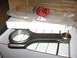 1981 Ford Mustang - New engine connecting rod in its original packaging with warranty details visible.