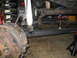 1987 Ford Bronco - Undercarriage view showing brake, suspension, and drivetrain parts.